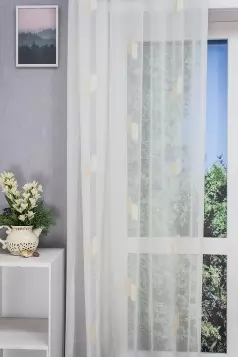 Tört fehér alapon, krém színű apró mintás tetra sablet függöny egyedi méretre varrva
